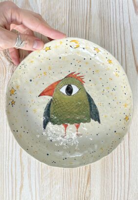 płytka miska malowana "Wielkooki ptak"